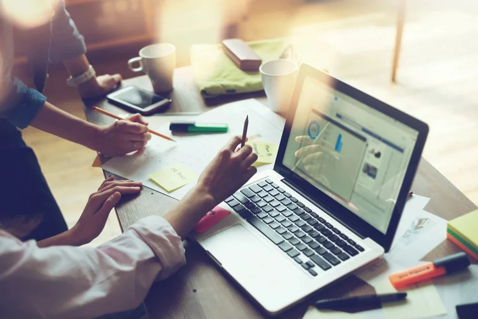Documents and working materials on a financial advisory desk